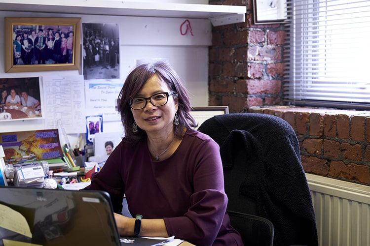 woman sitting at office desk